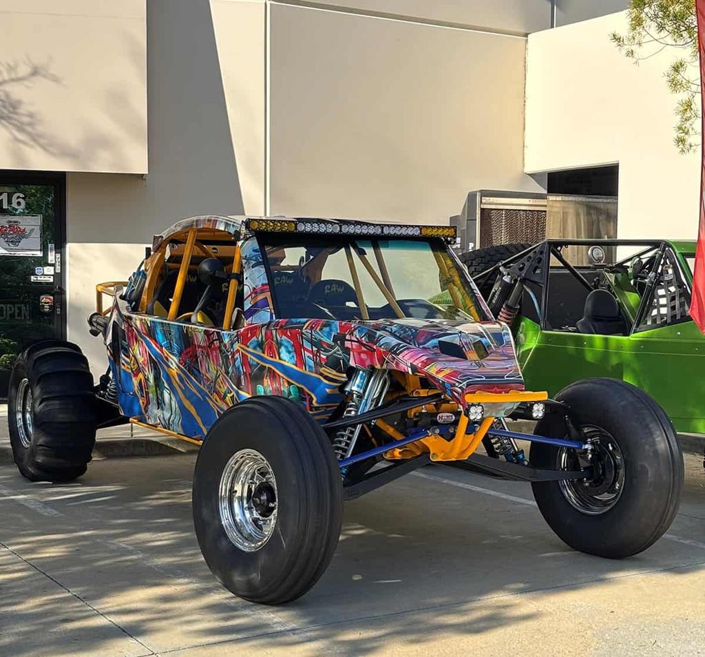 Finished custom off-road vehicle with vibrant multi-tone powder-coated finish